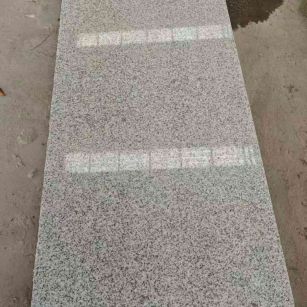 十堰芝麻白光面毛板